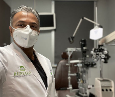 dr deepan selvadurai with his eye exam devices