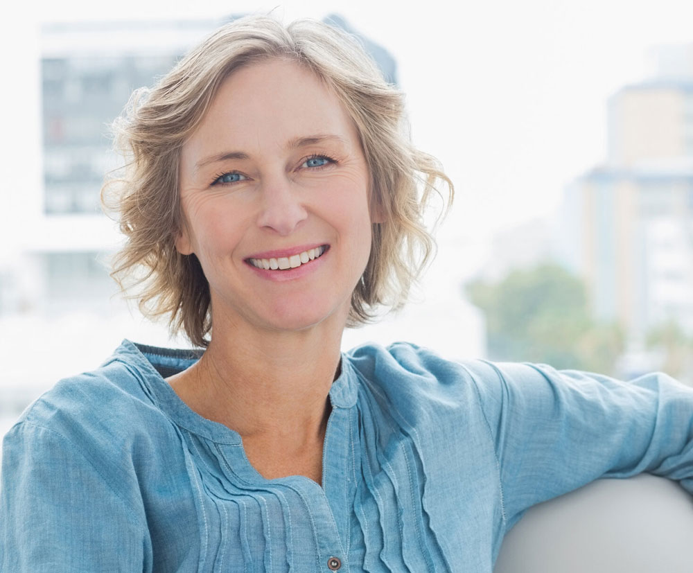 Blond woman smiling