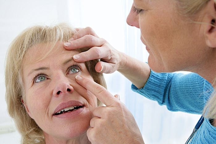 Woman having an eye check