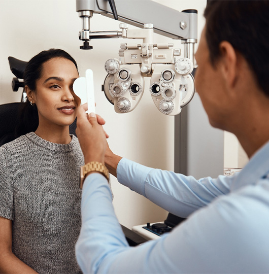Woman getting an eye exam at Buffalo Ophthalmology