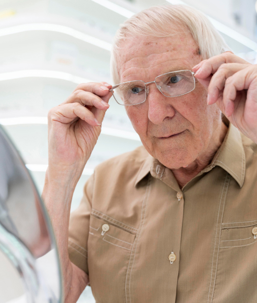 eye doctor with her old aged patient